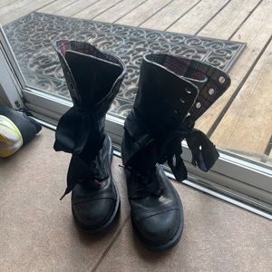 Dr.  Martin boots with satin laces.